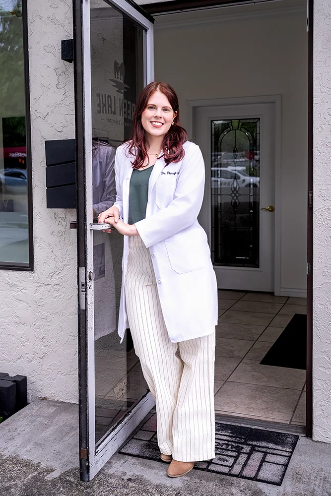 Dr. Ellison Standing At Green Lake Front Door